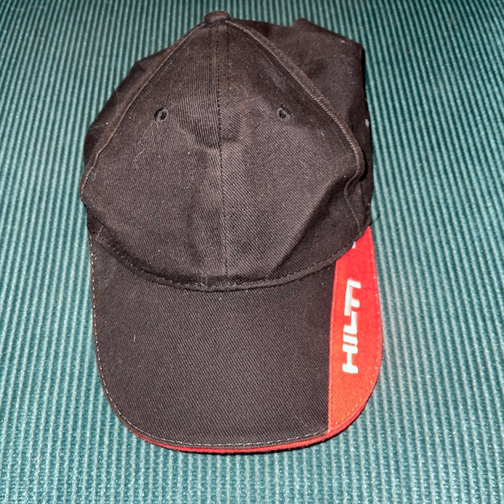 Hilti black bat with red detailing.